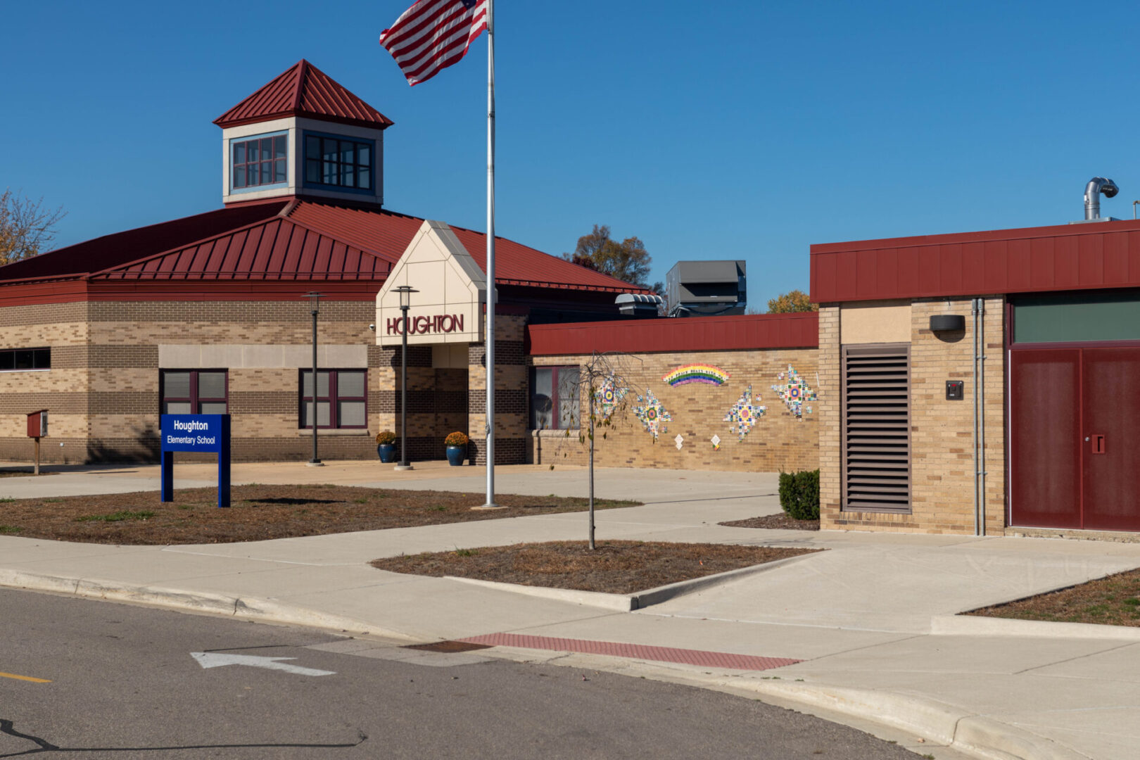 Houghton Elementary Building and a Flag